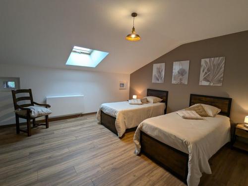 Postel nebo postele na pokoji v ubytování Maison chaleureuse avec Wifi à Sainte-Barbe - FR-1-589-753