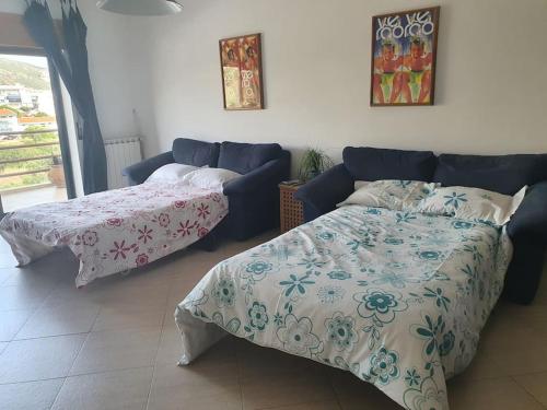 Ένα ή περισσότερα κρεβάτια σε δωμάτιο στο Sesimbra Seaside Apartment, Pool, Garage