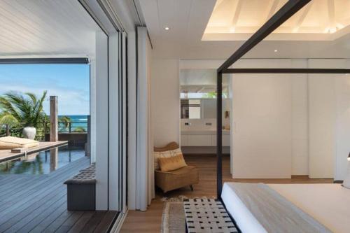 Säng eller sängar i ett rum på Villa Ocean'S 21