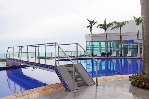 Swimmingpoolen hos eller tæt på Lodging Apartamento 31 Frente a la Playa