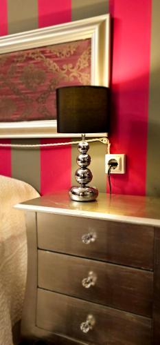 a desk with a chair on top of a dresser at La Casa de Lorenzo in Laguardia