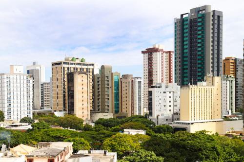 a view of a city with tall buildings at Promenade Pancetti Belo Horizonte in Belo Horizonte