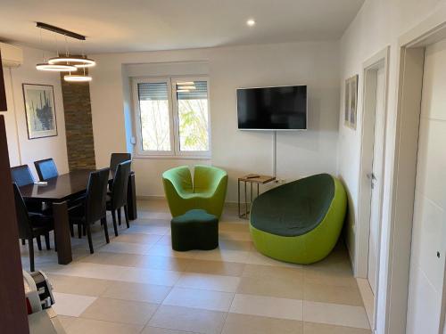 TV a/nebo společenská místnost v ubytování Ferienwohnung Zadar-City