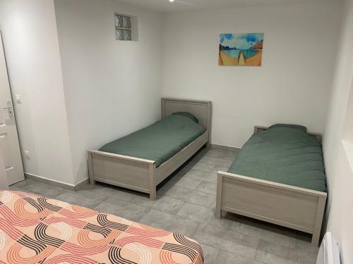 Postel nebo postele na pokoji v ubytování Appartement 1 - Hyper centre - 1 à 8 personnes