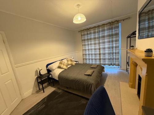 Ένα ή περισσότερα κρεβάτια σε δωμάτιο στο Lodge Causeway 4 bedroom house