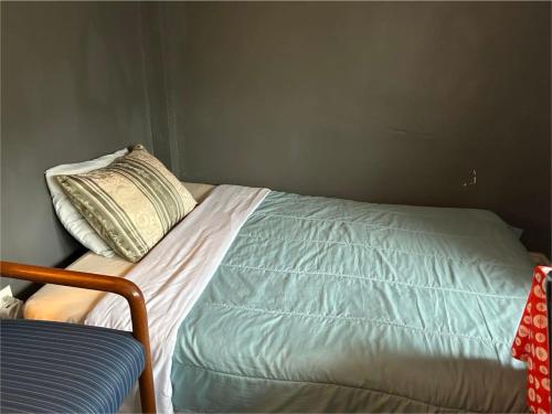 Giường trong phòng chung tại Maryland Homestay Apartment