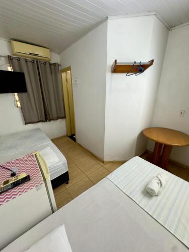 Postel nebo postele na pokoji v ubytování hotel Rio Madeira CANDEAIS