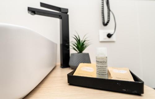 a black box with a moisturizing moisturizing moisturizing moisturizing moisturizingagent at Valguarnera Studio Apartments in Palermo