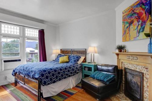 a bedroom with a bed and a chair at B Street C in Salt Lake City