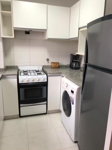 Kuchyň nebo kuchyňský kout v ubytování Sentite en Casa