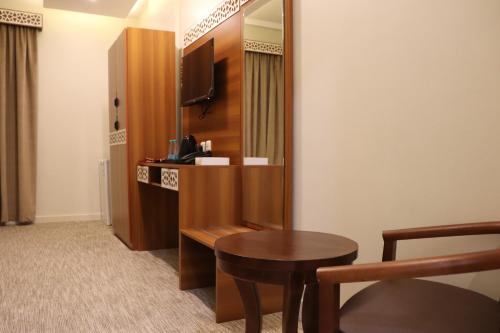 Fotografija v galeriji nastanitve فندق كنوز العنود مكة للغرف والشقق المفروشة توصيل مجاني للحرم - Knoz Al Anood Hotel Makkah For Furnished Rooms and Apartments Free Shuttle Service v Meki
