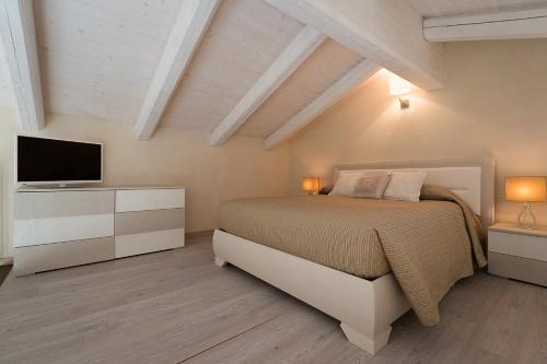 Кровать или кровати в номере Locanda San Giorgio