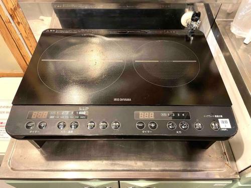 Una cocina o cocineta en 勝浦一棟貸切宿 やます
