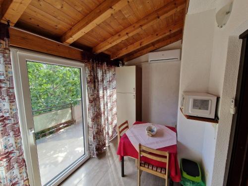 Apartments by the sea Banjol, Rab - 22362