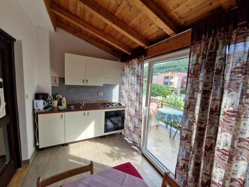 Apartments by the sea Banjol, Rab - 22362