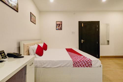 Katil atau katil-katil dalam bilik di Super Hotel O Axom Inn
