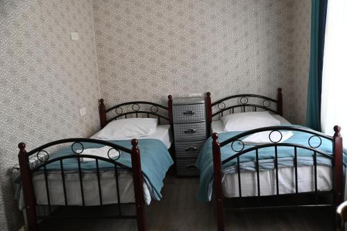 Postel nebo postele na pokoji v ubytování Babulya House