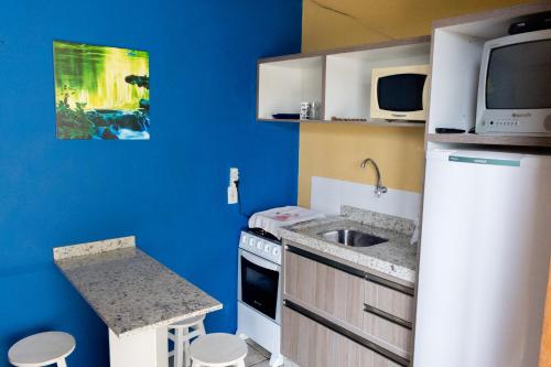 Dapur atau dapur kecil di Pousada Vento & Cia