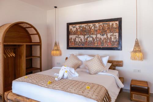 Abing Villas Spa & Beach Barにあるベッド