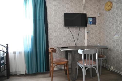 TV a/nebo společenská místnost v ubytování Babulya House