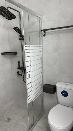 Un baño de Coworking Guest House