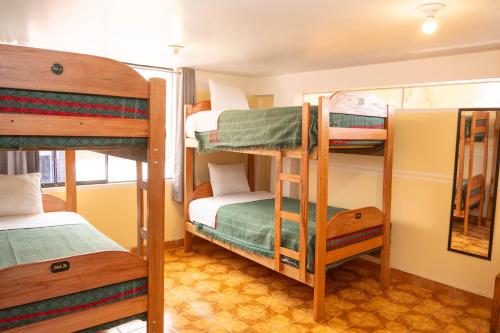 Voodi või voodid majutusasutuse Conquistador Hotel toas