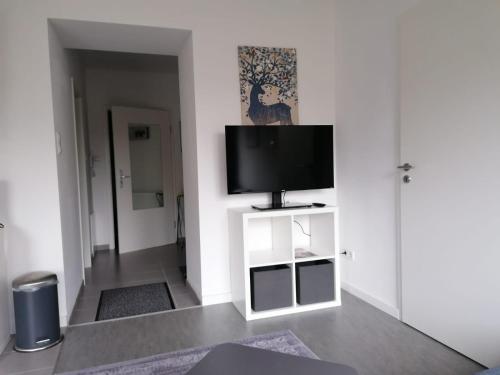 Μια τηλεόραση ή/και κέντρο ψυχαγωγίας στο Haus Charlottenburg 1, zentrumsnah gelegen, mit Blick auf die Festung