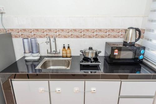 Una cocina o cocineta en PortDickson Beachfront Home 10pax3BR 1MinToBeach