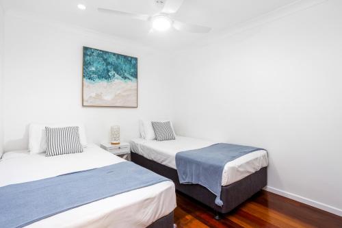 Postel nebo postele na pokoji v ubytování Beachfront Retreat Yeppoon