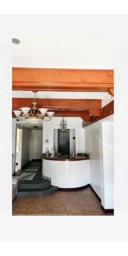 a large room with a bar in a building at Van Nuys Downtown Paradise in Los Angeles