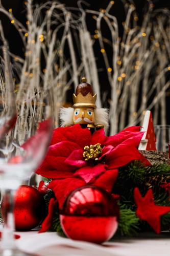 a santa claus figurine sitting on top of a table at Bodensee Hotel Storchen in Uhldingen-Mühlhofen