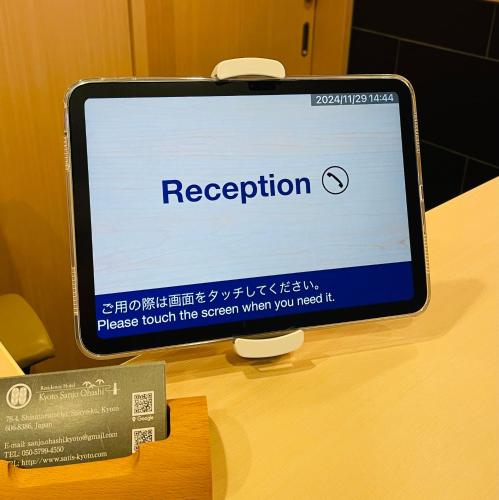 a computer screen with registration on it on a desk at Kyoto Sanjo Ohashi in Kyoto