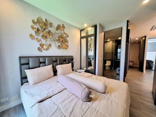 Postel nebo postele na pokoji v ubytování The Modern Hua-Hin Private Poolvilla from beach 3km