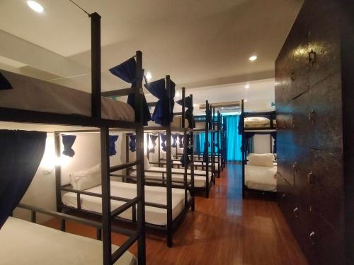 Ένα ή περισσότερα κρεβάτια σε δωμάτιο στο Popeyes Hostel Patong