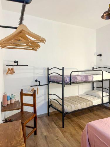 Postel nebo postele na pokoji v ubytování Trilli EcoBnB