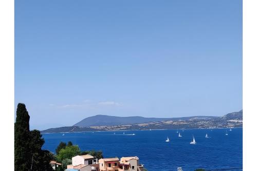 a view of a large body of water with boats at Christianna studios in Nikiana