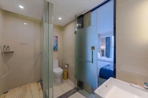 Koupelna v ubytování Echarm Hotel Wuhan Hanyang Wangjiawan Sixin Avenue Metro Station