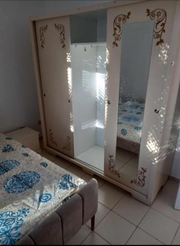 Ένα ή περισσότερα κρεβάτια σε δωμάτιο στο Diar el Bahr Mahdia