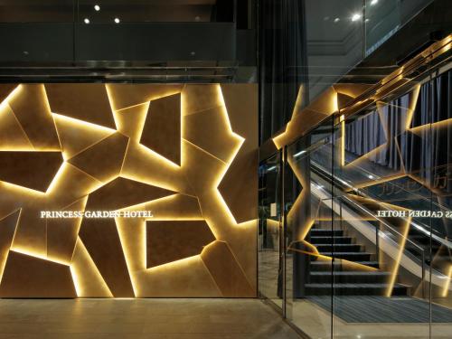 a wall of a building with a stair case at Princess Garden Hotel in Nagoya