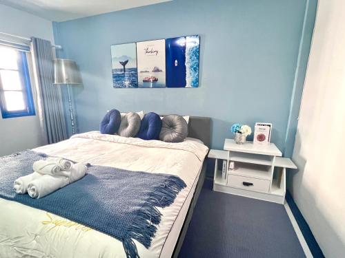 Ένα ή περισσότερα κρεβάτια σε δωμάτιο στο Comfort Home Patong