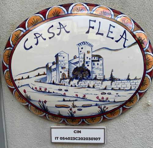 a plate with a picture of a city on it at Casa Flea - Holiday apartment with 2 bedrooms in Gualdo Tadino
