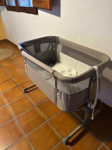 a metal cart on the floor in a room at El LABRAO DE ALARDOS in El Raso