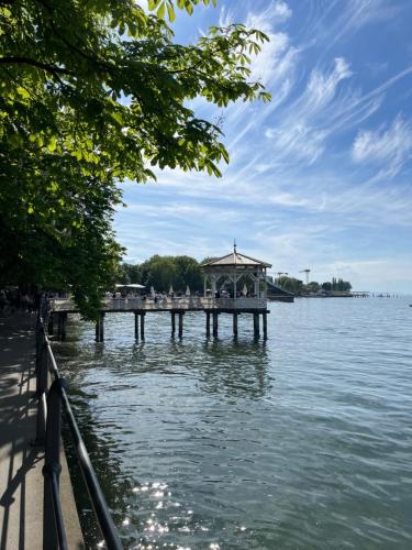 a pier with a gazebo in the water at Apartment Mia Luise in Nüziders