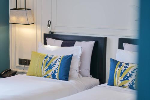 Maison Vy Hotel Hội Anにあるベッド