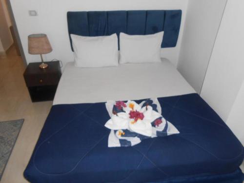Postel nebo postele na pokoji v ubytování Fox Hotel El Ahyaa
