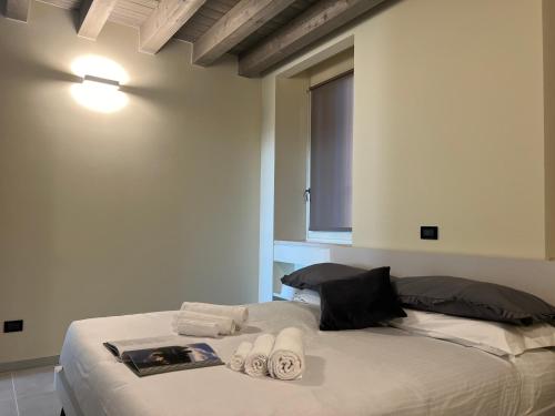 Postel nebo postele na pokoji v ubytování Stelle di Verona - Cordelia
