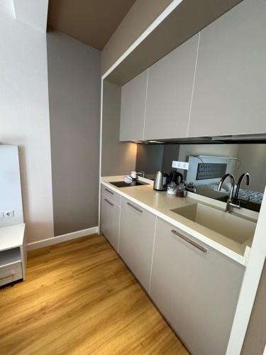 Kuchyň nebo kuchyňský kout v ubytování Alliance palace 18 floor