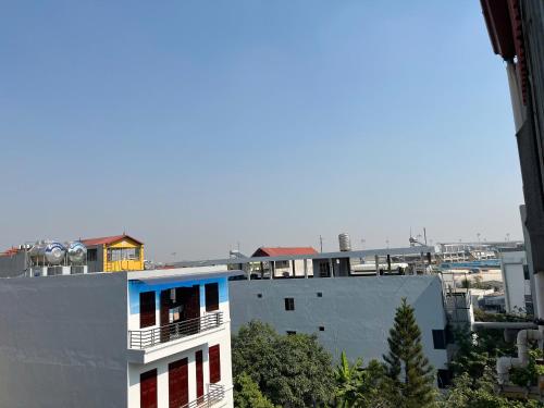 a view of a city from a building at Huy Hoang Airport in Hanoi