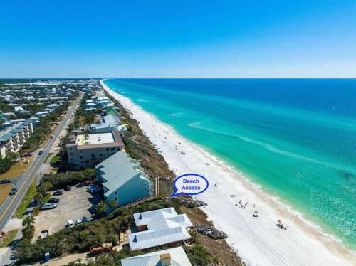 an overhead view of a beach and the ocean at Sandy's Seacrest in Inlet Beach