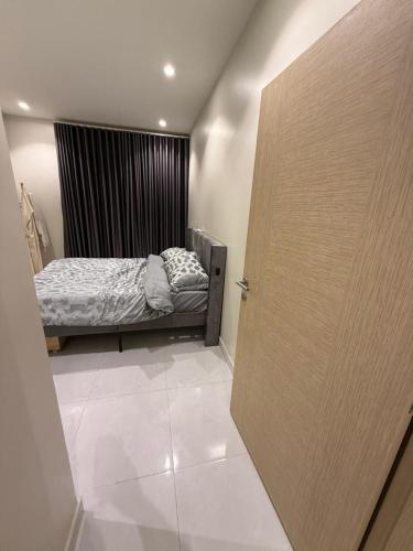 Postel nebo postele na pokoji v ubytování Cozy Separate Apartment in Muscat